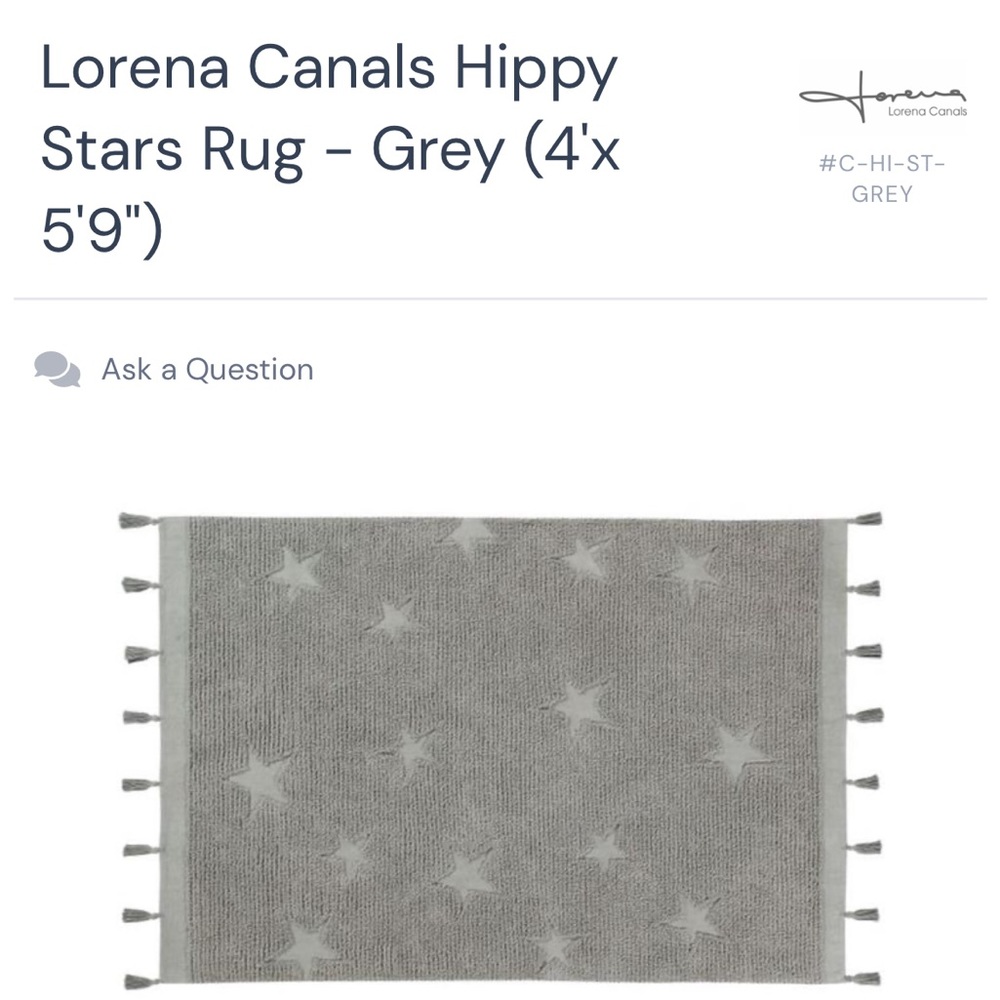 Lorna Canals washable area rug, grey, with stars and tassels. 4’x5.9’.